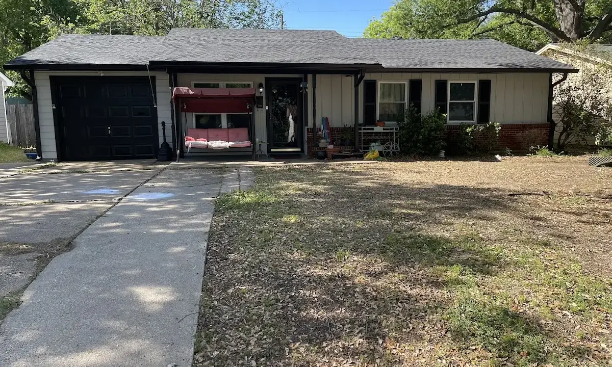 Asphalt Shingle Roof Repair crew at work on a residential roof in Enterprise